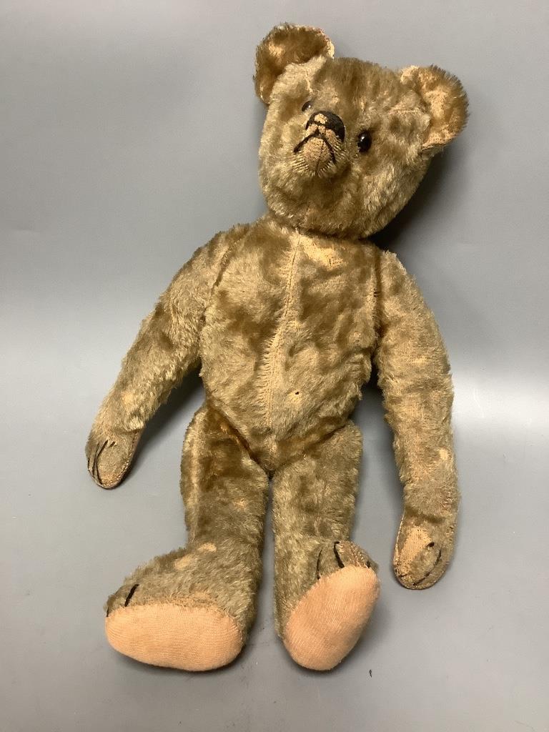 A vintage teddy bear DAN TO REPORT
